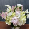 An elegant blend of hydrangeas, peonies , calla Lilies and other beautiful