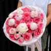 A delicate, cloud-like bouquet featuring premium garden roses and soft peonies in