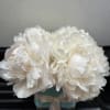White peony bouquet in a small blue box with a ribbon