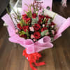 Celebrate Mom with elegance and love.
This beautiful bouquet features premium red roses