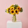 This sunflower vase arrangement an instant mood lifter-perfect as a birthday bouquet