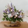 Theme Colors: Shades of lavender, White, peachy and green 

Featured Blooms: Roses