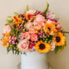 Product Information
Theme Colors: Pink, yellow, and Green.

Featured Blooms: Roses, Alstroemerias, Sun flowers