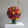 Beautiful bright roses , green hydrangeas, carnations and spray roses along with