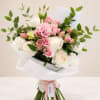 Designed with a curated selection of seasonal blooms for an elegant and