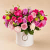 Designed with a curated selection of seasonal blooms, including tulips and fresh