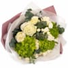 Designed with a curated selection of seasonal blooms for an elegant and