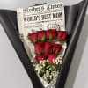 Deep, velvety red roses gathered in a compact, upright cluster create a