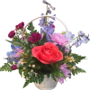Soft pink and lavender chrysanthemum-like blooms and deep magenta carnations surround the