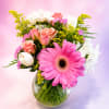 A charming and cheerful arrangement designed to make anyone smile, Sweet Blossom