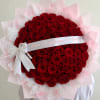 A breathtaking arrangement of premium red roses, beautifully styled in a full