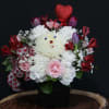 Feeling love struck with Puppy Love! This cute arrangement will definitely get