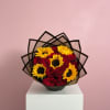 Bouquet of red roses and yellow sunflowers wrapped in black paper