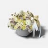 A refined, modern arrangement designed in a sleek ceramic bowl,featuring soft ivory