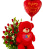 Red teddy bear with heart balloons and a bouquet of roses