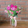 10 pink or purple tulips with gorgeous pink ranunculus in a sweet