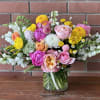 Colorful mixed bouquet in a clear glass vase