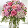 This pastel assortment of roses is absolutely beautiful and will take her