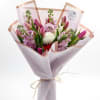 Graceful, airy, and beautifully composed, this bouquet blends the sweetest shades of