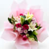Soft, graceful, and beautifully composed, this bouquet blends the sweetest shades of