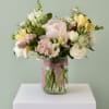 A breezy, garden-style flower arrangement that feels like a soft spring morning-this