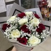 Deep red and creamy white roses are artfully combined in this Eternal