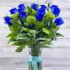 Fresh blue dozen roses with green.