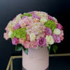 A soft and luxurious floral arrangement designed in a romantic pastel tones