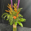 Bold, tropical energy defines this tall celebration bouquet-perfect as an anniversary surprise