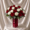 A stunning and timeless floral arrangement designed with 24 premium red and