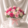 A refined and elegant floral design featuring a curated mix of hot