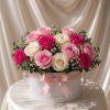 A refined and elegant floral design featuring a curated mix of hot