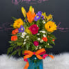 Bursting with sunshine and vintage charm, this flower arrangement is a joyful