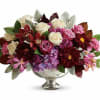  Pet Friendly?
No - This arrangement contains Chrysanthemums, which are toxic to