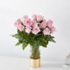 The picture perfect petals of pink roses gracefully unfold, showcasing their timeless