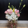 A soft, romantic Mother&rsquo;s Day vase arrangement featuring pale pink roses, white