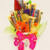 ALL MIXED CANDIES ARRANGED IN A BEAUTIFUL CONTAINER PERFECTLY DECORATED, NICE PRESENTATION
