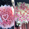 A rounded cluster of soft pink roses forms the heart of this