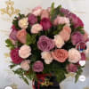 A lush cluster of pink, lavender, peach, and white blooms makes a