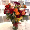 This country wildflower&ndash;inspired arrangement brings the charm of open fields and simple