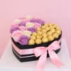 A bold and luxurious heart-shaped arrangement featuring a stunning mix of pink