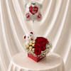 A romantic gift featuring lush red roses and delicate baby&rsquo;s breath, beautifully