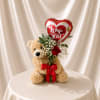 Teddy bear with a heart balloon and red rose bouquet