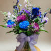Bold, elegant, and full of striking color, the Midnight Sapphire Bouquet is