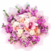 Un elegante  bouquet en tonos  rosados y lavanda dose&ntilde;ados con