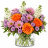 Bright, cheerful, and full of life &mdash; this vibrant arrangement is designed