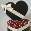 Deep, romantic, and unmistakably luxe - this heart-shaped flower arrangement makes a