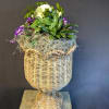 Elevate their space with our Happy Blooms mixed garden urn. 