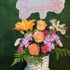Fresh flowers on a box. Color and flower substitution might apply