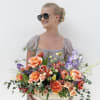 The Elise embodies modern elegance with a vibrant mix of delicate blooms.